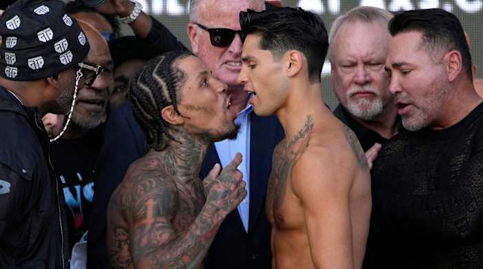 Gervonta Davis and Ryan Garcia exchange words at the weigh-in.